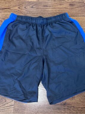 Nike Black Shorts with Blue Side Panels